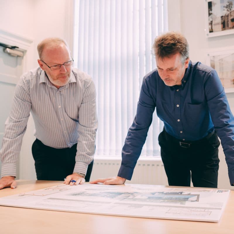 Architects working at a table